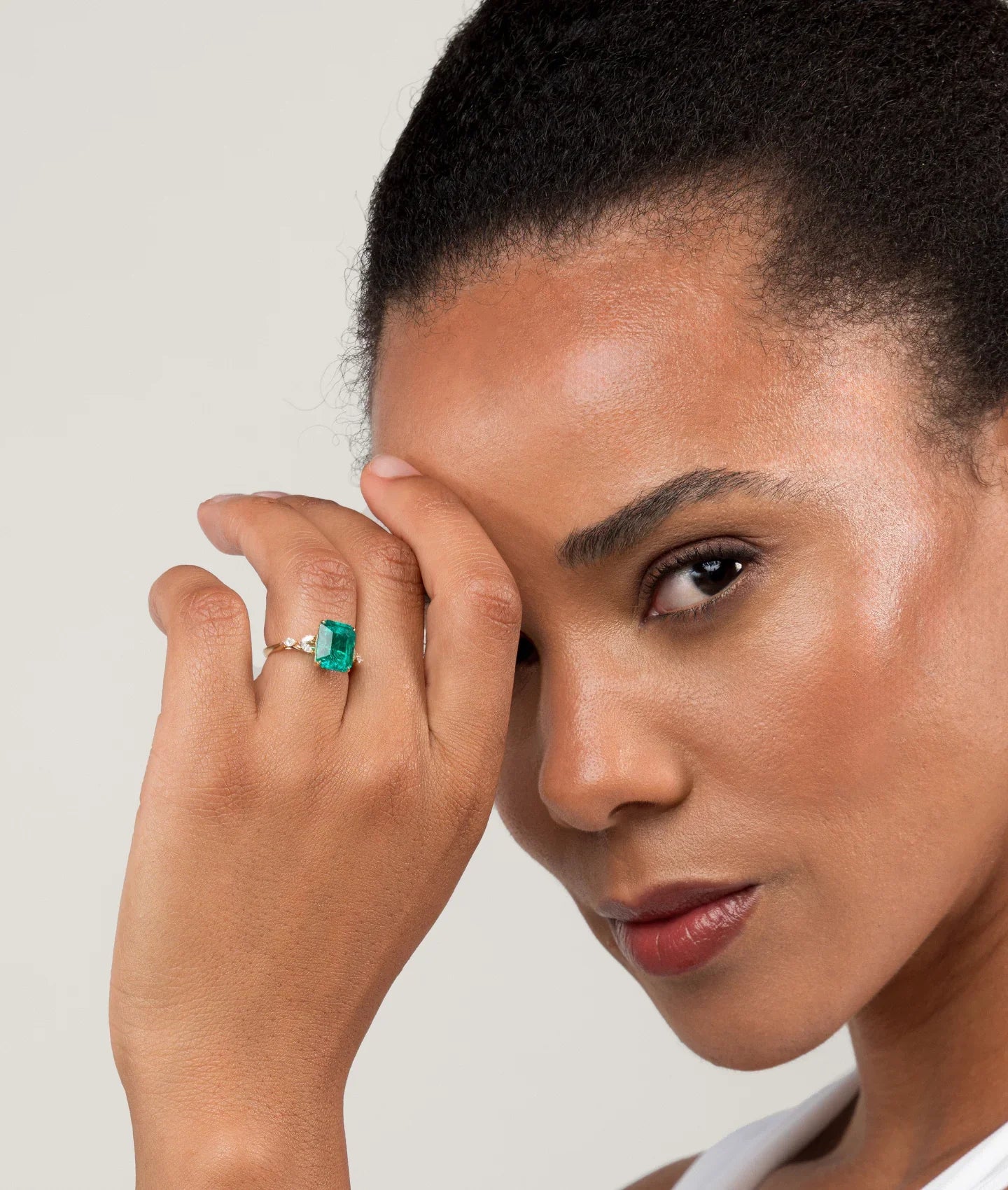 Emerald-cut lab-grown emerald engagement ring, bestseller style from Keanis collection.