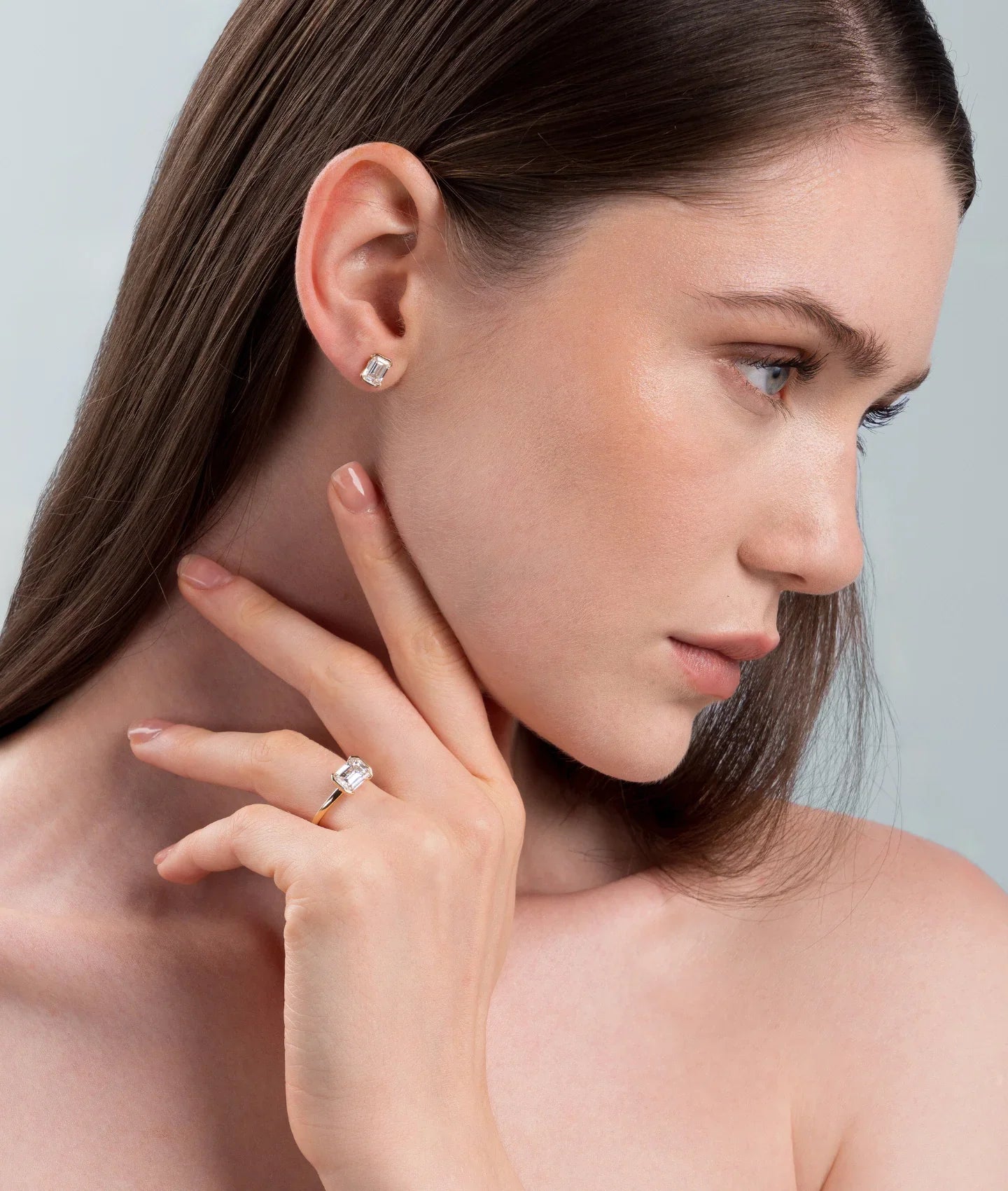 Half-bezel emerald-cut lab-grown diamond engagement ring, bestseller style from Keanis collection.