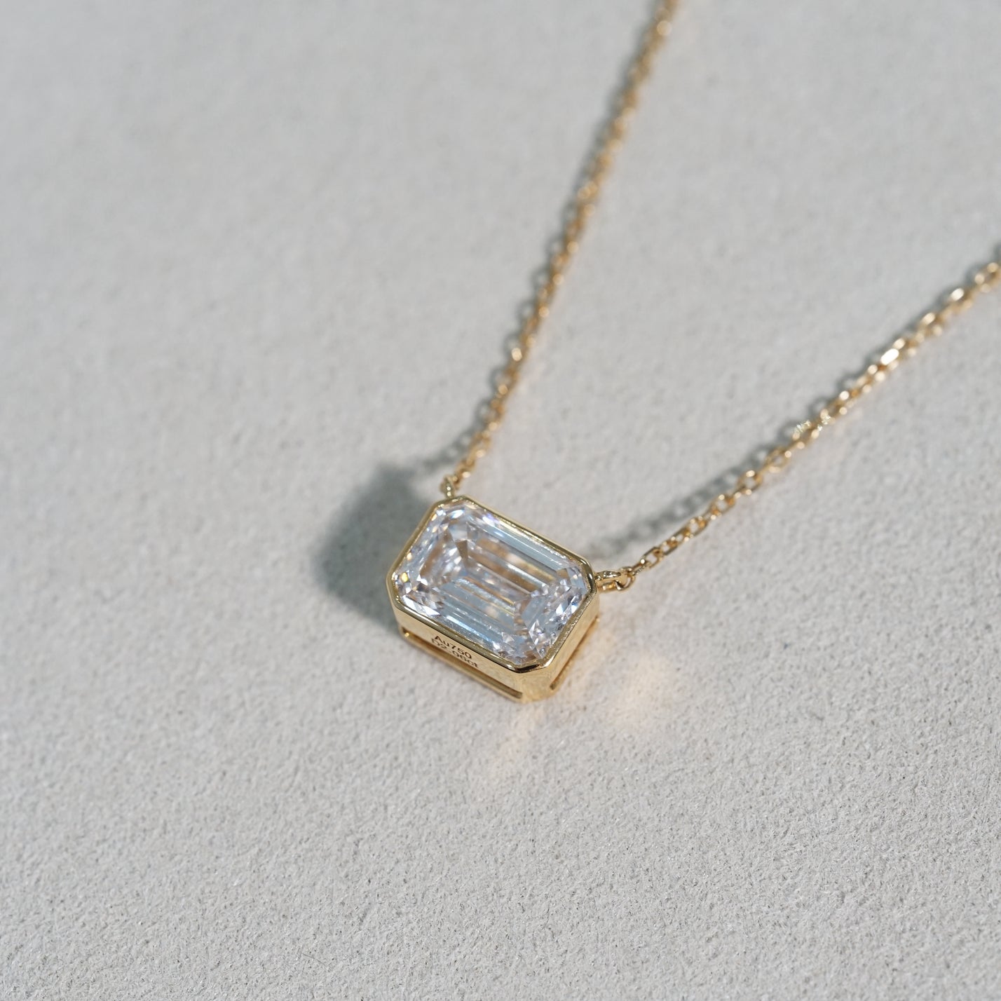 IGI 2.06ct Emerald Cut Lab Diamond, 18K Yellow Gold Bezel Set Necklace
