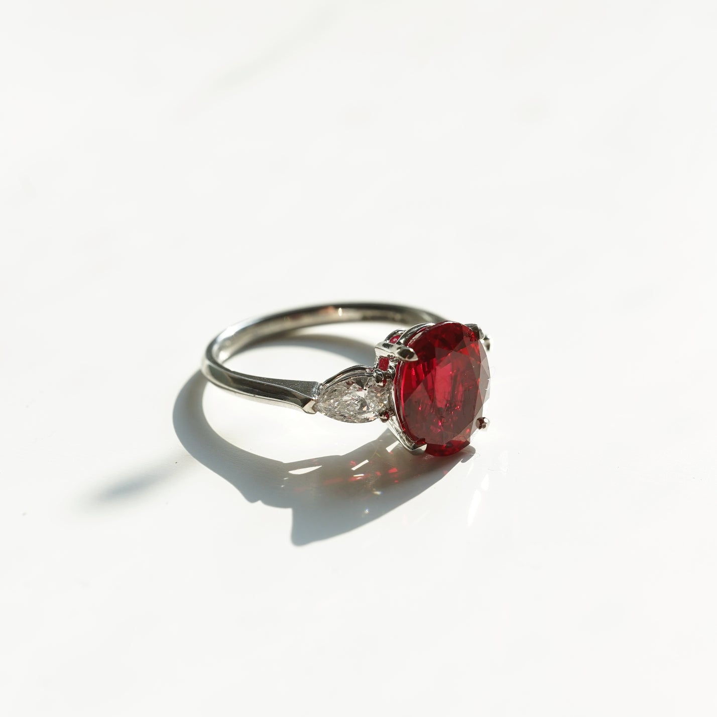 Charlotte, IGI 4.24ct Oval Cut Lab Ruby, PT950 Trilogy Ring