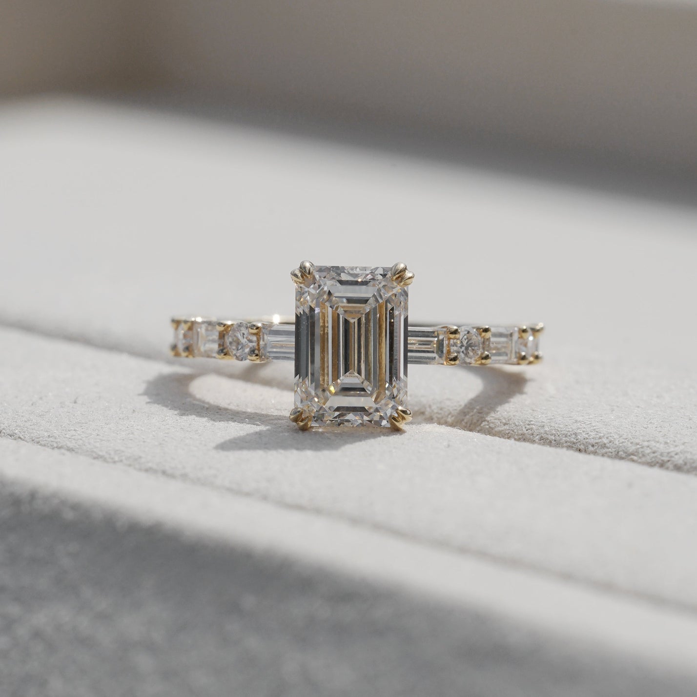 Edith, IGI 2.07ct D VVS2 Emerald Cut Lab Diamond, 18K Yellow Gold Ring with Round & Baguette Pavé