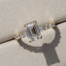 Edith, IGI 2.07ct D VVS2 Emerald Cut Lab Diamond, 18K Yellow Gold Ring with Round & Baguette Pavé