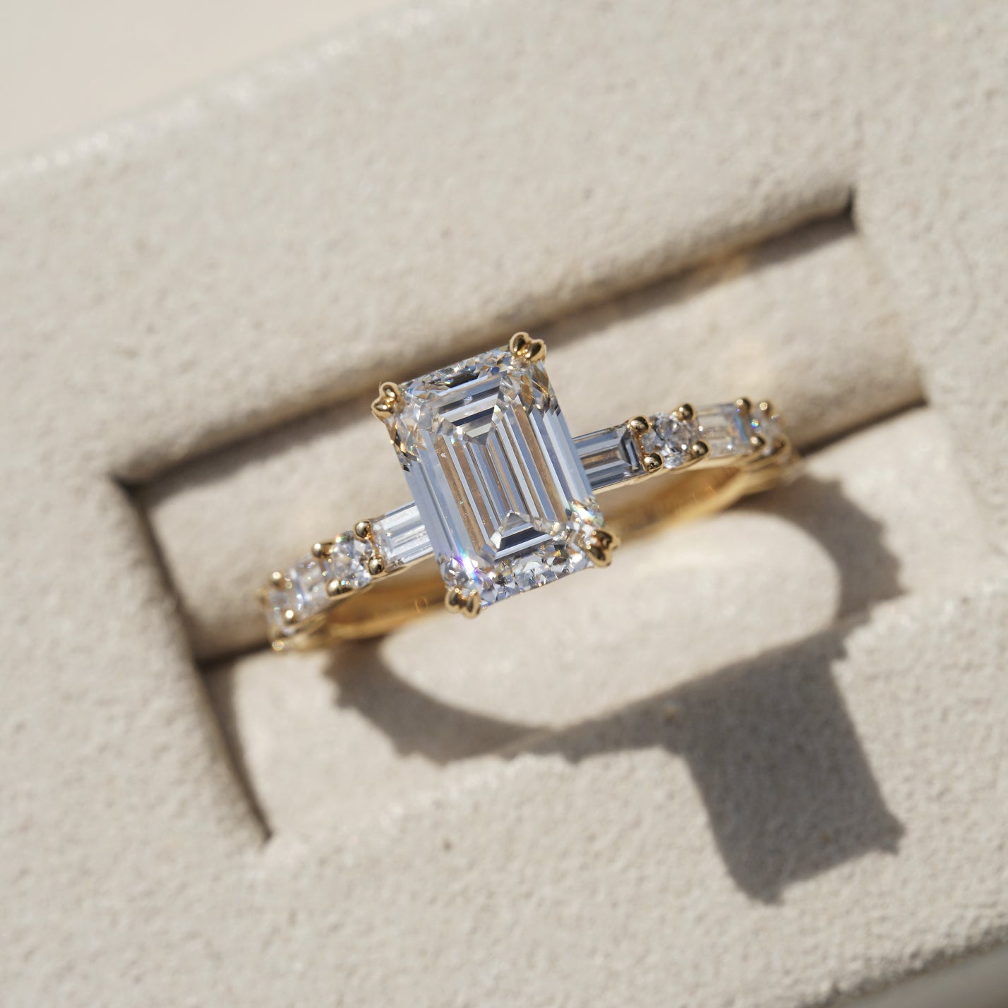 Edith, IGI 2.07ct D VVS2 Emerald Cut Lab Diamond, 18K Yellow Gold Ring with Round & Baguette Pavé