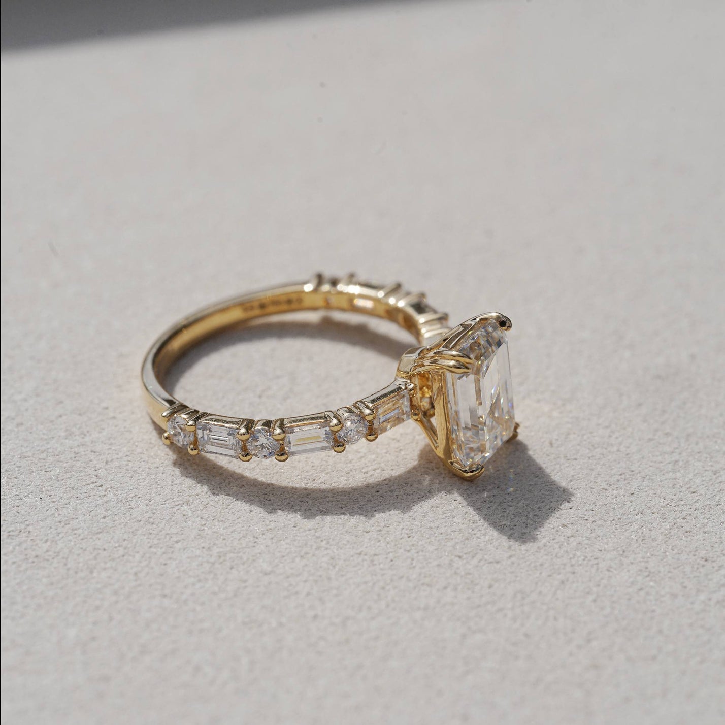 Edith, IGI 2.07ct D VVS2 Emerald Cut Lab Diamond, 18K Yellow Gold Ring with Round & Baguette Pavé