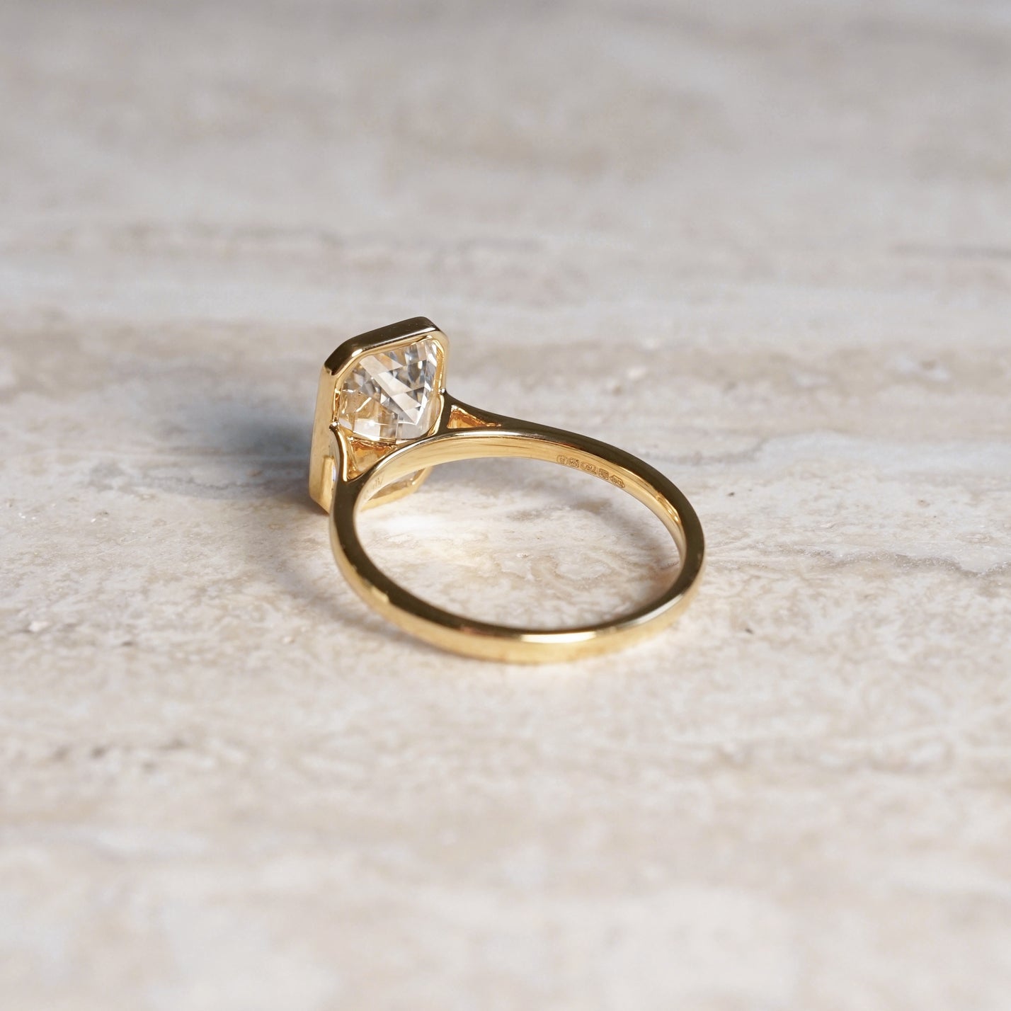 Ellie, IGI 3.08ct Emerald Cut Lab Diamond, 18K Yellow Gold Bezel Solitaire Ring