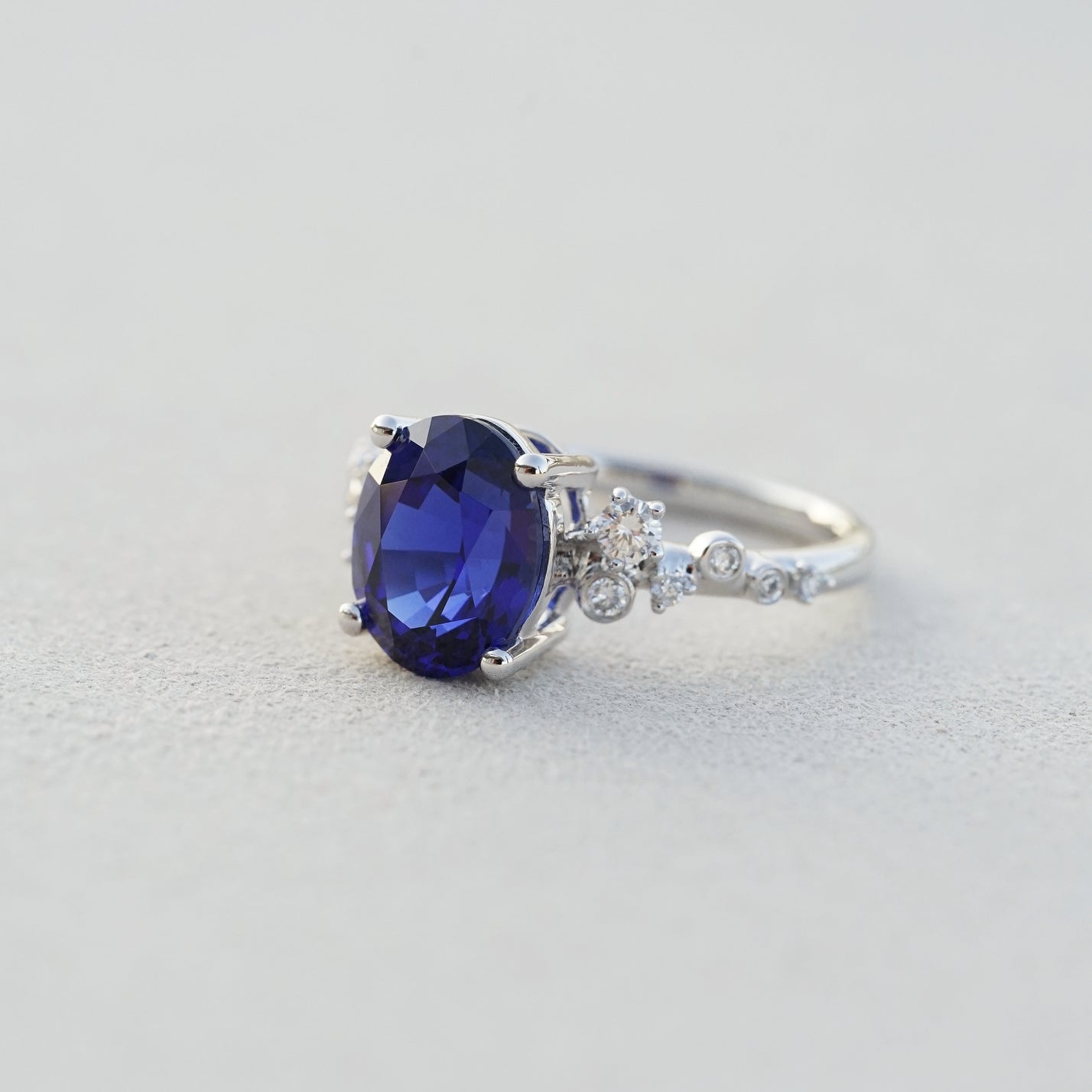 Nova, IGI 3.19ct Oval Cut Lab Sapphire, PT950 Cluster Ring