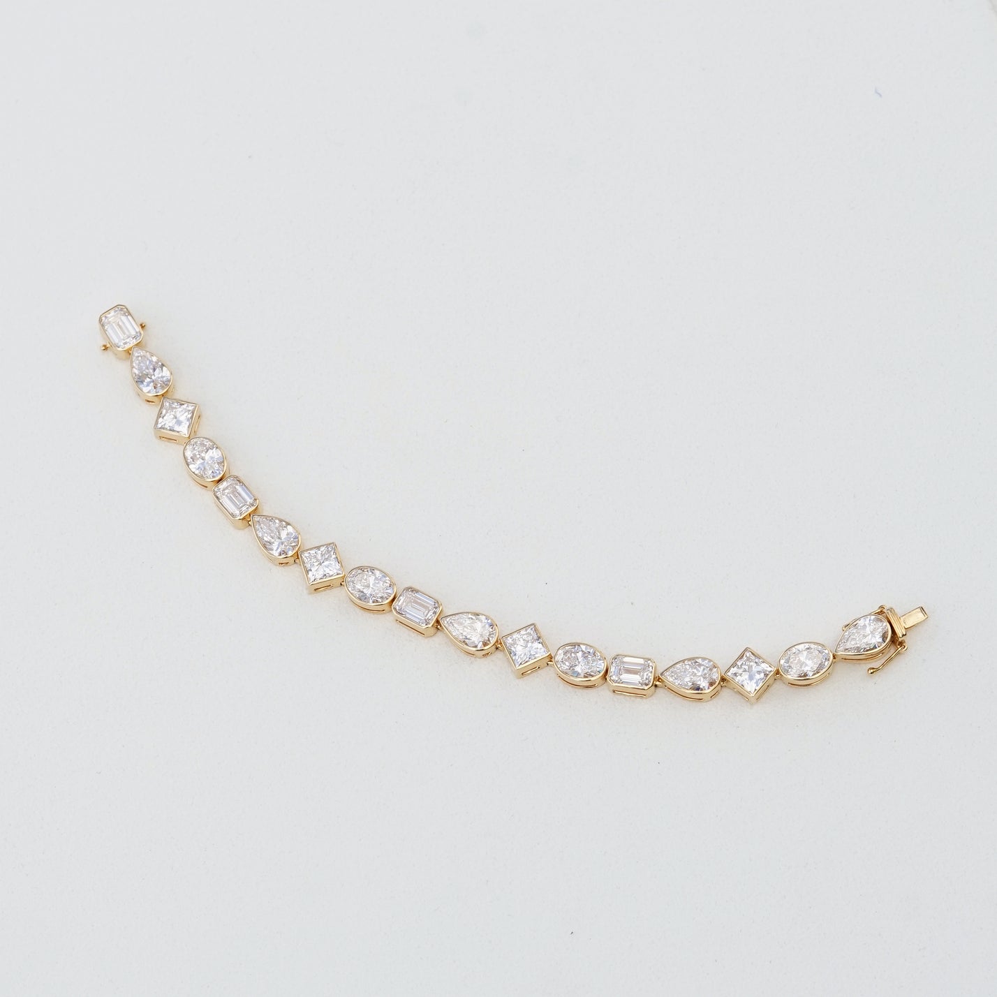 IGI 17.88ct Mixed Fancy Cuts Lab Diamond, 18K Yellow Gold Bezel Tennis Bracelet