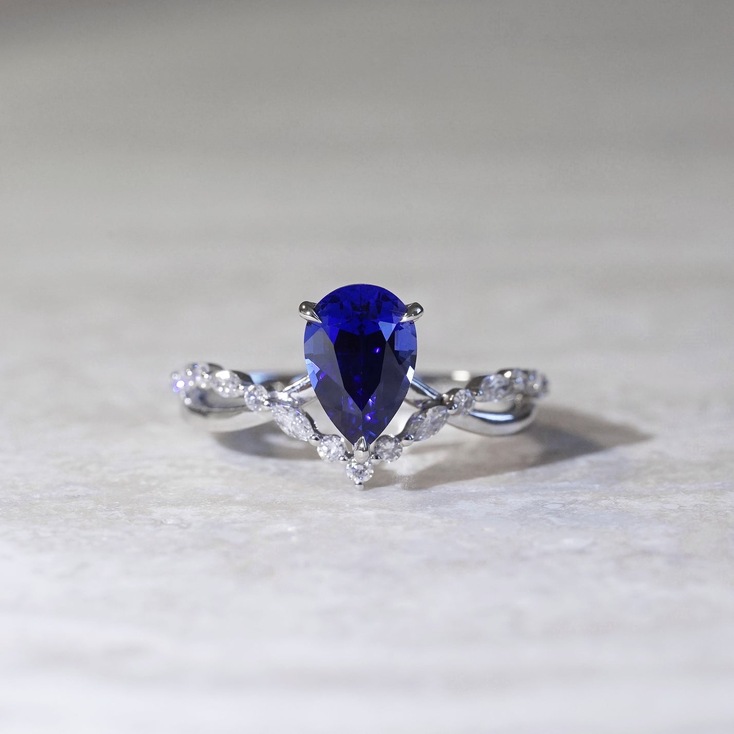The One, IGI 1.97ct Pear Cut Lab Sapphire, PT950 V-shaped Twist Engagement Ring