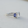 The Promise, IGI 3.09ct D VVS2 Emerald Cut Lab Diamond, PT950 Trilogy Ring with lab Sapphire Accents