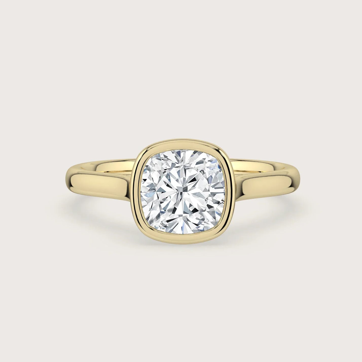 Cushion cut lab-grown diamond solitaire engagement ring, bezel set in 18k yellow gold. "R25201CU" front view.