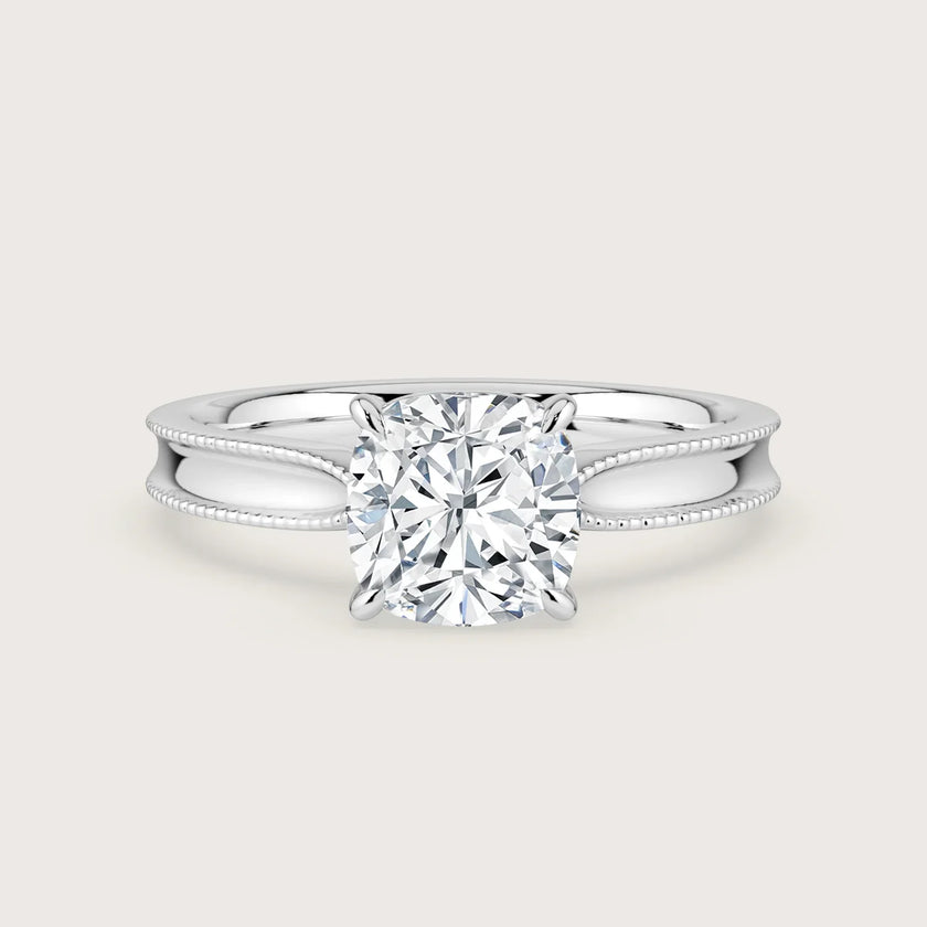 Lab-grown cushion diamond solitaire engagement ring, 18k white gold, milgrain detail. "R24821CU" front view.