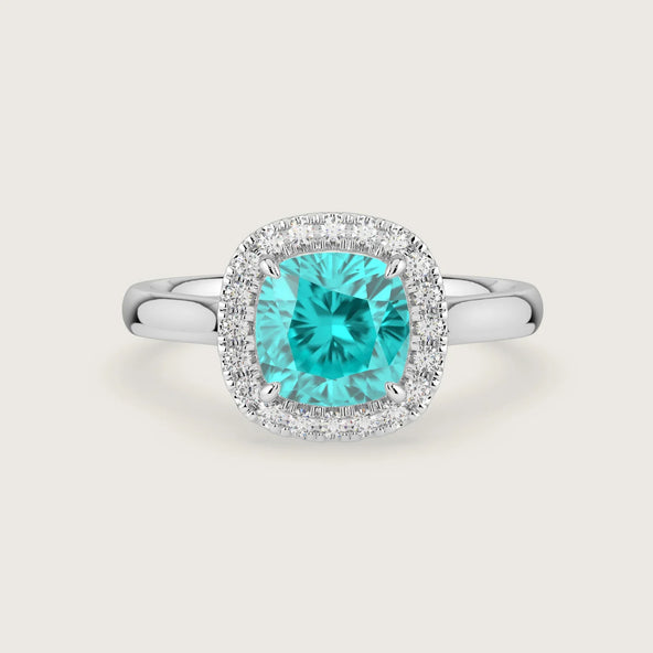 Lab-Grown Cushion Paraiba Halo Engagement Ring" in 18k white gold. Dazzling, vibrant blue gemstone.