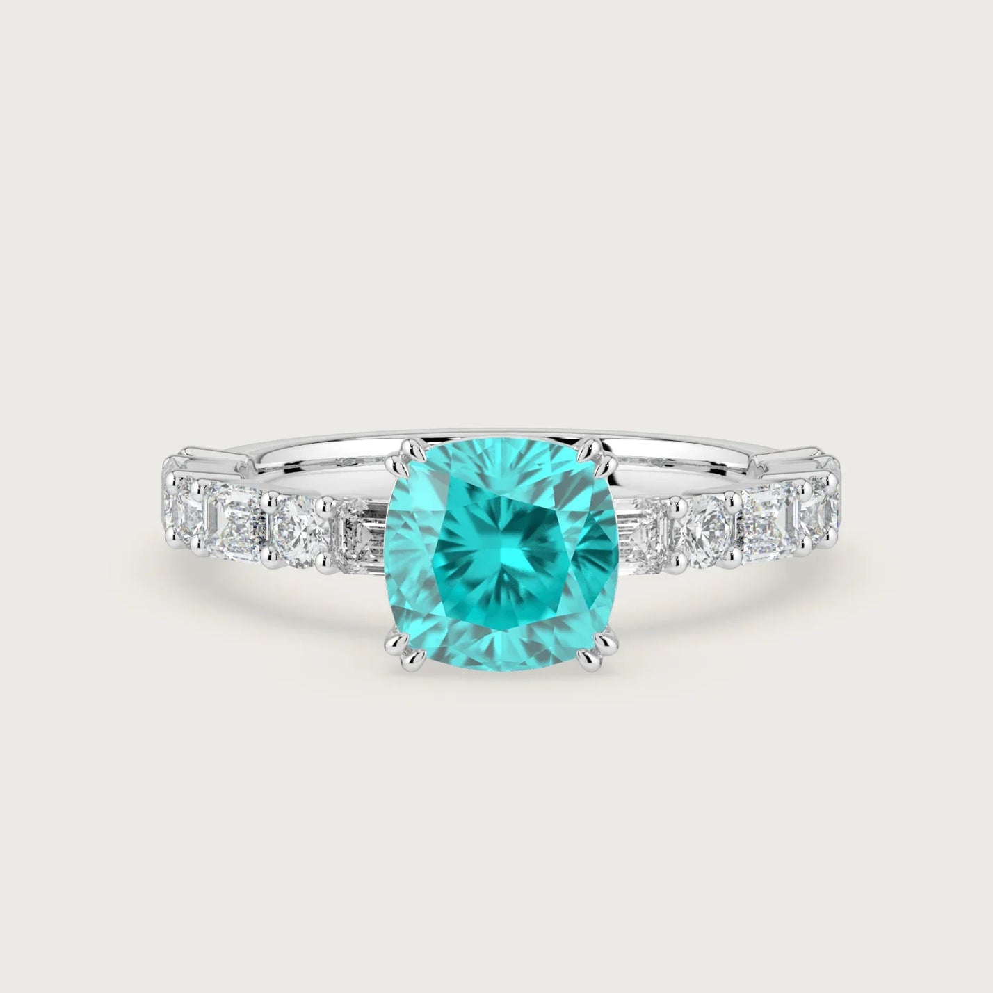 Lab-grown cushion Paraiba solitaire engagement ring in 18k white gold with diamond band.