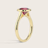 Lab-grown cushion ruby solitaire ring. Bezel-set in 18k yellow gold, side view. "R25201CU" style.