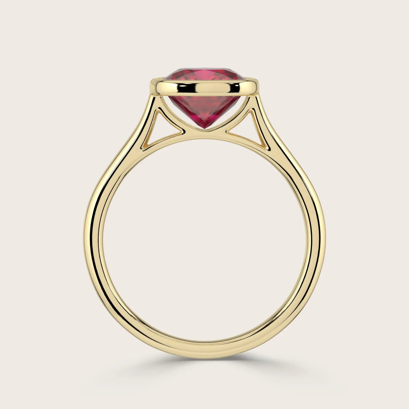 18k gold solitaire ring with cushion-cut lab-grown ruby in bezel setting. "R25201CU" side view.
