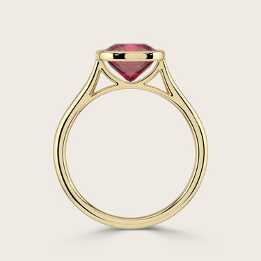 18k gold solitaire ring with cushion-cut lab-grown ruby in bezel setting. "R25201CU" side view.