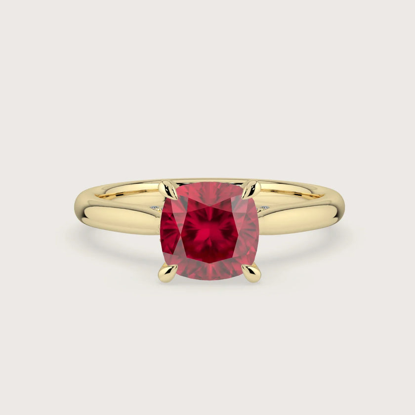 Cushion cut lab-grown ruby solitaire engagement ring with hidden halo in 18k yellow gold. "R24819CUH.