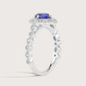 Lab-grown cushion sapphire ring in 18k white gold with diamond halo and band. "R25307CUHA" detail.