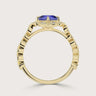 Side view of "R25307CUHA" 18k yellow gold ring with cushion-cut lab-grown sapphire and diamond halo band.