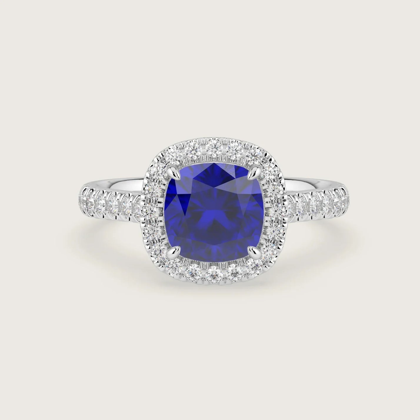 Lab-grown cushion sapphire engagement ring. Diamond halo and band in 18k white gold. "R24818CUHA.