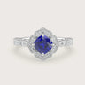 Lab-grown cushion sapphire engagement ring with diamond halo and band in 18k white gold. "R25307CUHA" style.