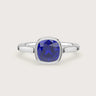 Lab-grown cushion sapphire solitaire "R25201CU" engagement ring in 18k white gold, bezel set.
