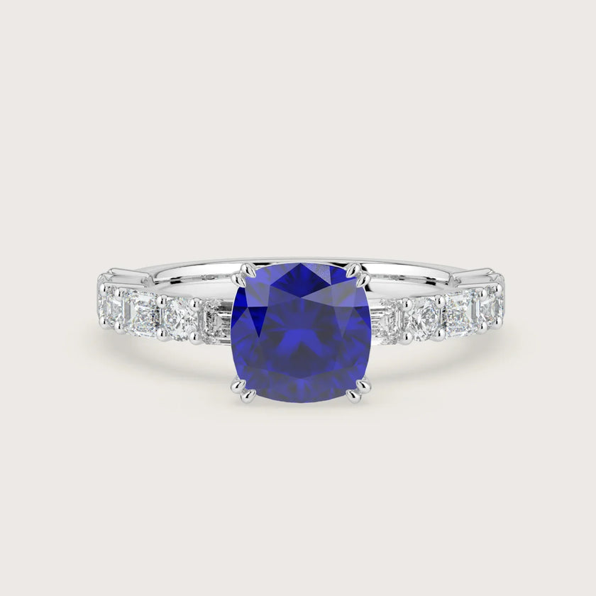 Lab-grown cushion sapphire solitaire engagement ring. Diamond band, 18k white gold setting. "R24831CUA.