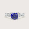 Lab-grown cushion sapphire solitaire engagement ring. Diamond band, 18k white gold setting. "R24831CUA.