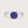 Lab-grown cushion sapphire solitaire engagement ring. 18k white gold with milgrain detailing. "R24821CU.
