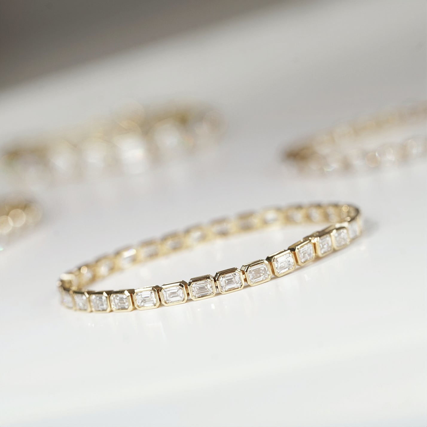 Emerald Cut Diamond Bezel Set Tennis Bracelet