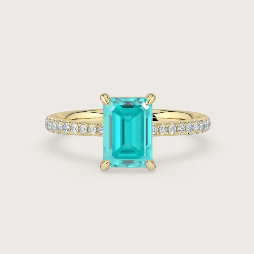 Lab-grown Emerald "Paraiba" diamond band engagement ring in 18k yellow gold. Modern, elegant design.