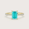 Lab-grown Emerald "Paraiba" diamond band engagement ring in 18k yellow gold. Modern, elegant design.
