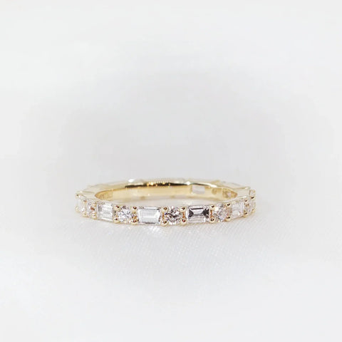 18k yellow gold wedding ring featuring lab-grown emerald and round diamonds. "W24833EMA" style.