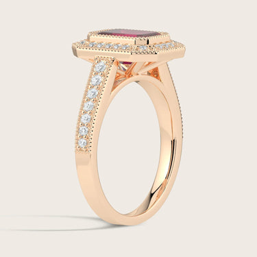 Rose gold ring with lab-grown ruby & diamond halo. "Milgrain" vintage band detail.