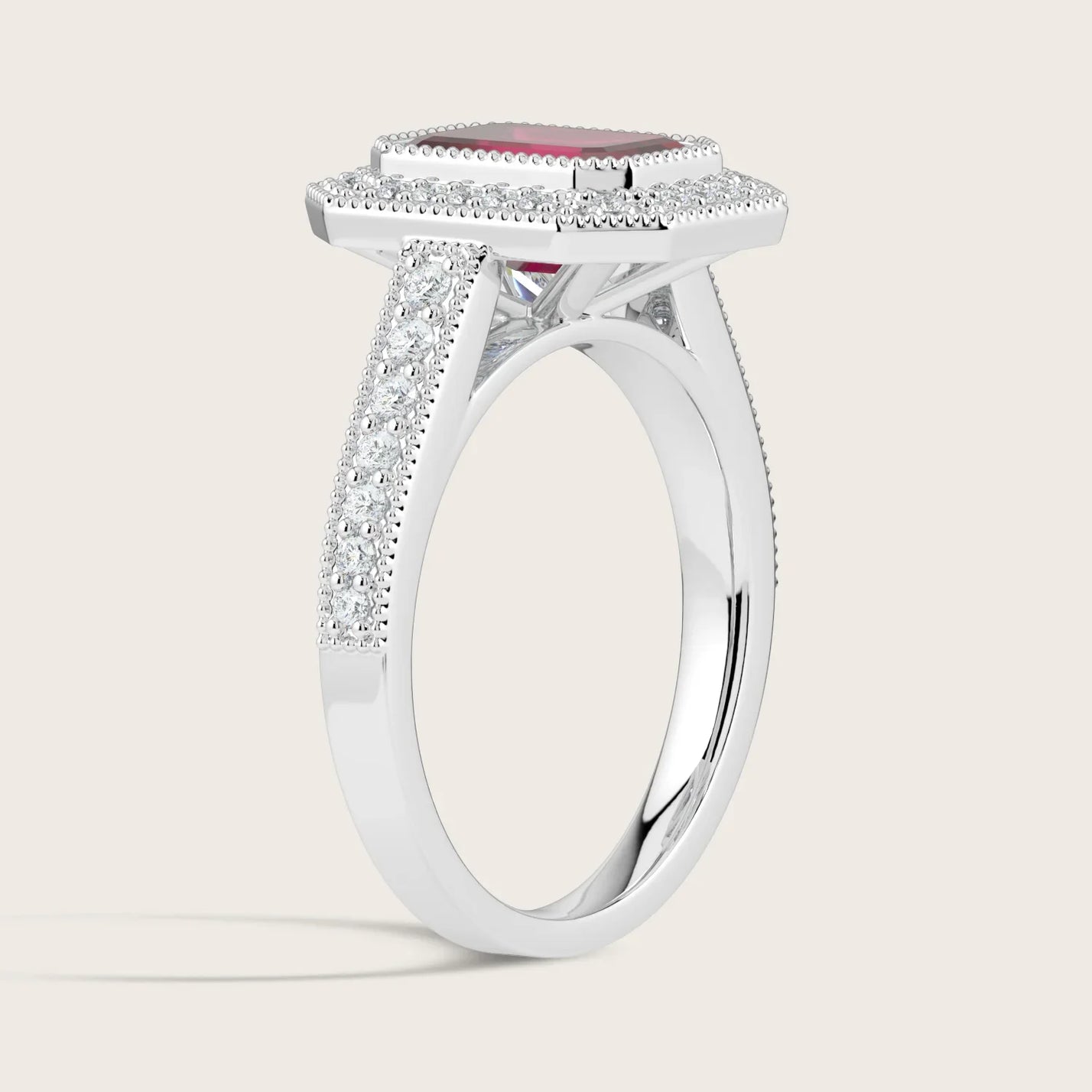 Lab-grown emerald-cut ruby ring, "halo milgrain vintage diamond band", 18k white gold. Side view.