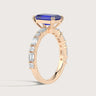 Rose gold ring with lab-grown sapphire center stone and diamond band. "R24831EMA" detail.