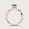 Rose gold band with "lab-grown sapphire" and lab-grown diamond accents.