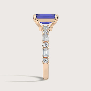 Side view of "R24831EMA" 18k rose gold ring with lab-grown sapphire and diamond band from Keanis.co.uk.