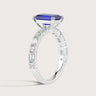 Lab-grown sapphire ring. Emerald cut, set in 18k white gold with diamond band. "R24831EMA" side view.