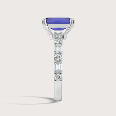Side view of "R24831EMA" 18k white gold ring with lab-grown sapphire and diamond band.