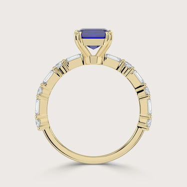Lab-grown sapphire ring in 18k yellow gold with diamond accents, "R24831EMA". Side view showcasing the band's details.