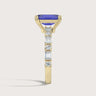 Lab-grown sapphire ring in 18k yellow gold, "R24831EMA," with diamond accents. Side view.