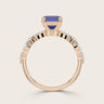 Rose gold ring with lab-grown blue sapphire and marquise diamonds. "R24837EMA" detail.
