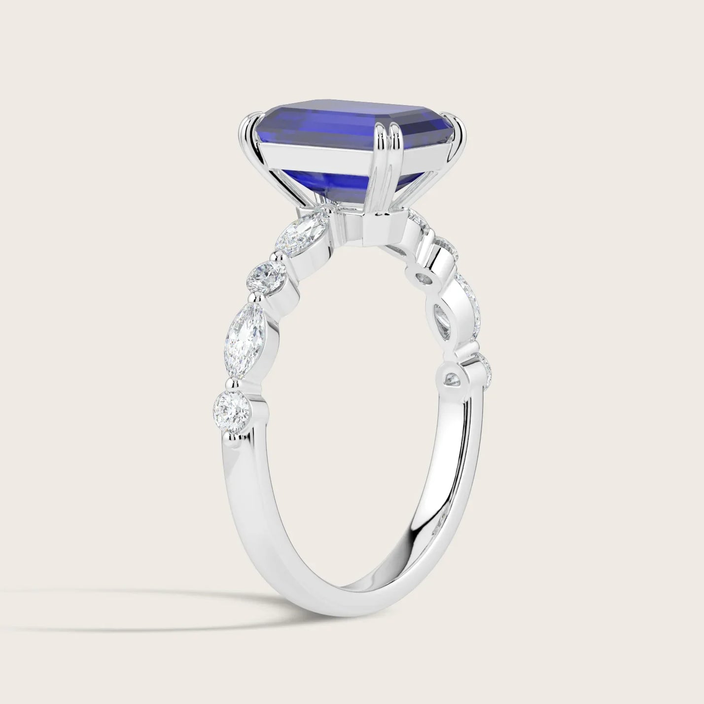 Lab-grown sapphire ring. White gold band with marquise & round diamonds. "R24837EMA" side view.