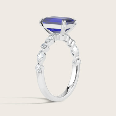 Lab-grown sapphire ring. White gold band with marquise & round diamonds. "R24837EMA" side view.