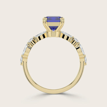 Lab-grown emerald cut blue sapphire ring in 18k yellow gold with marquise and round diamond band. "R24837EMA.