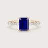 Rose gold engagement ring with lab-grown sapphire center stone and diamond accents. "R24837EMA" style.
