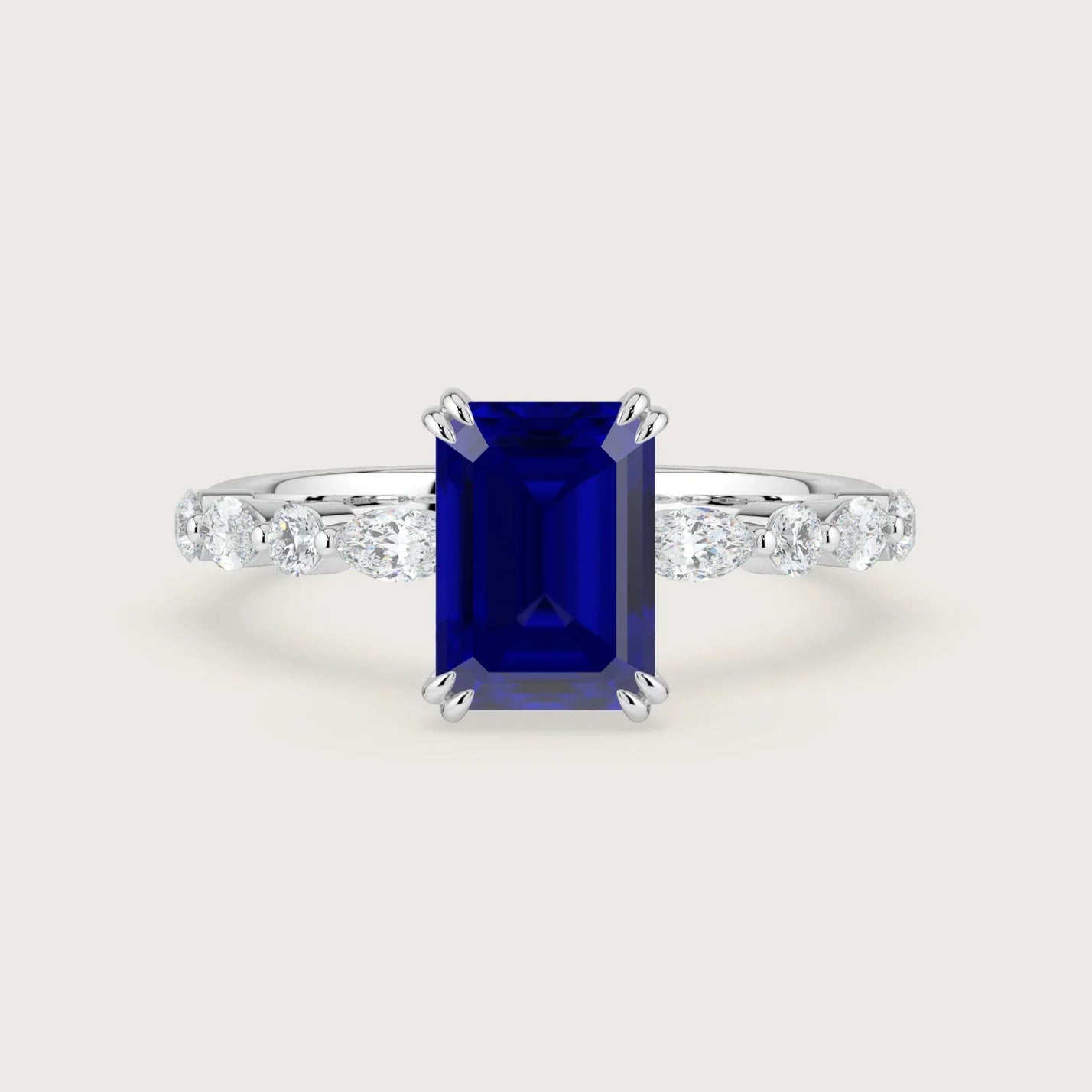 18k white gold engagement ring with a lab-grown emerald cut sapphire and diamond band. "R24837EMA.