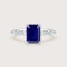 18k white gold engagement ring with a lab-grown emerald cut sapphire and diamond band. "R24837EMA.