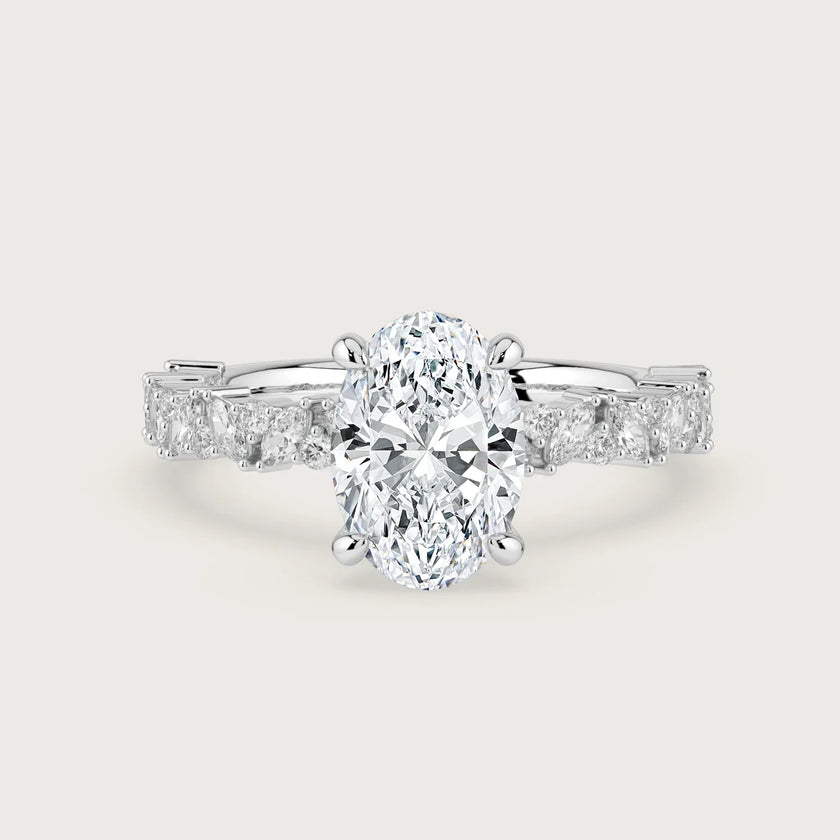 Lab-grown oval diamond engagement ring. 18k white gold band with diamond accents. "R24830OVA" style.
